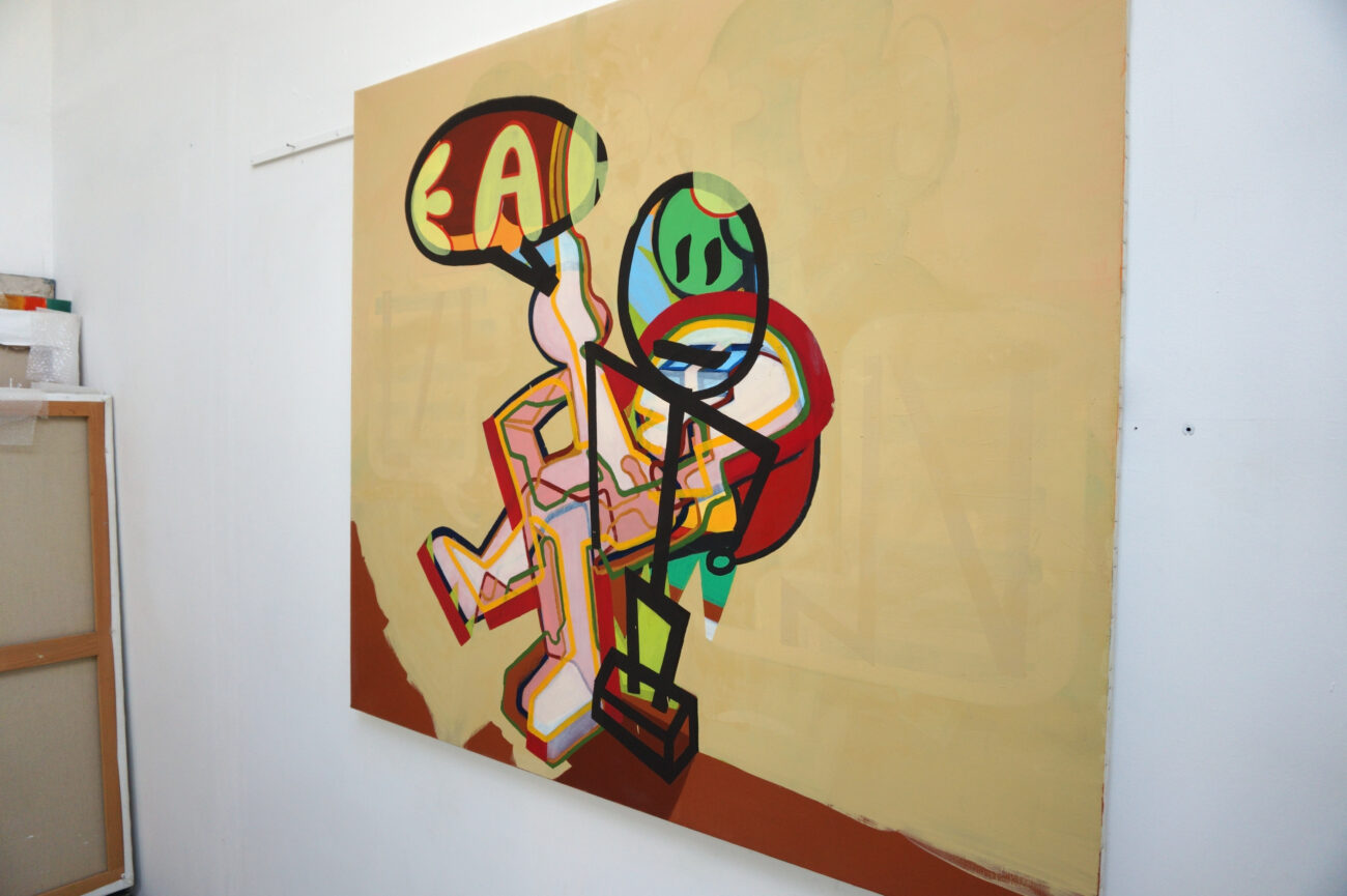 Ici on peut voir une peinture de Benoît Andro qui représente deux personnages robotiques superposés et l’image qui en résulte est donc brouillée.